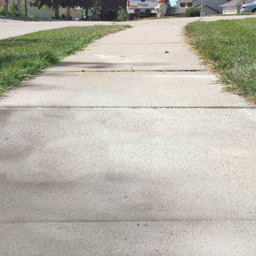 Uneven sidewalk lifted and leveled with Polylevel