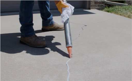 NexusPro silicone-based sealant installation on cracked concrete