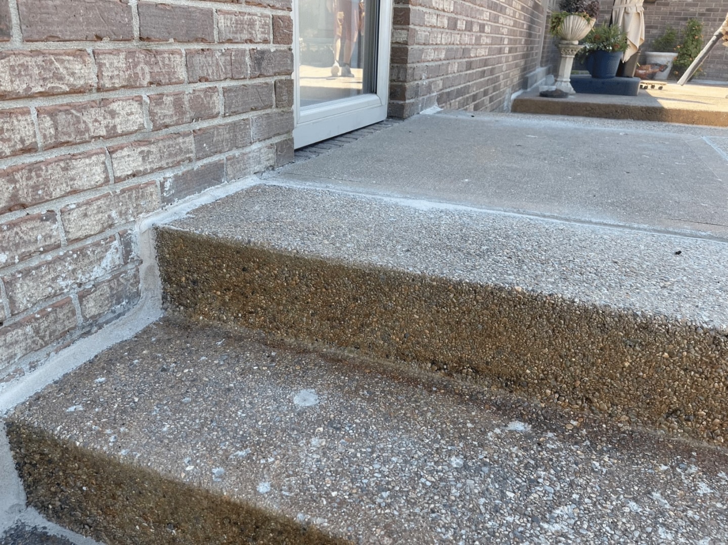 Cracked and sunken concrete step after repair