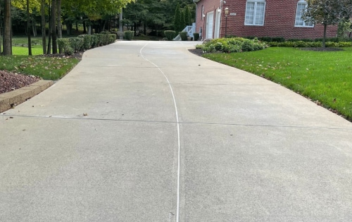 Concrete driveway clean, seal, and joint repair
