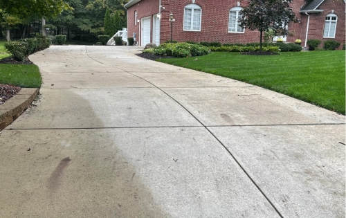 Driveway before cleaning and sealing