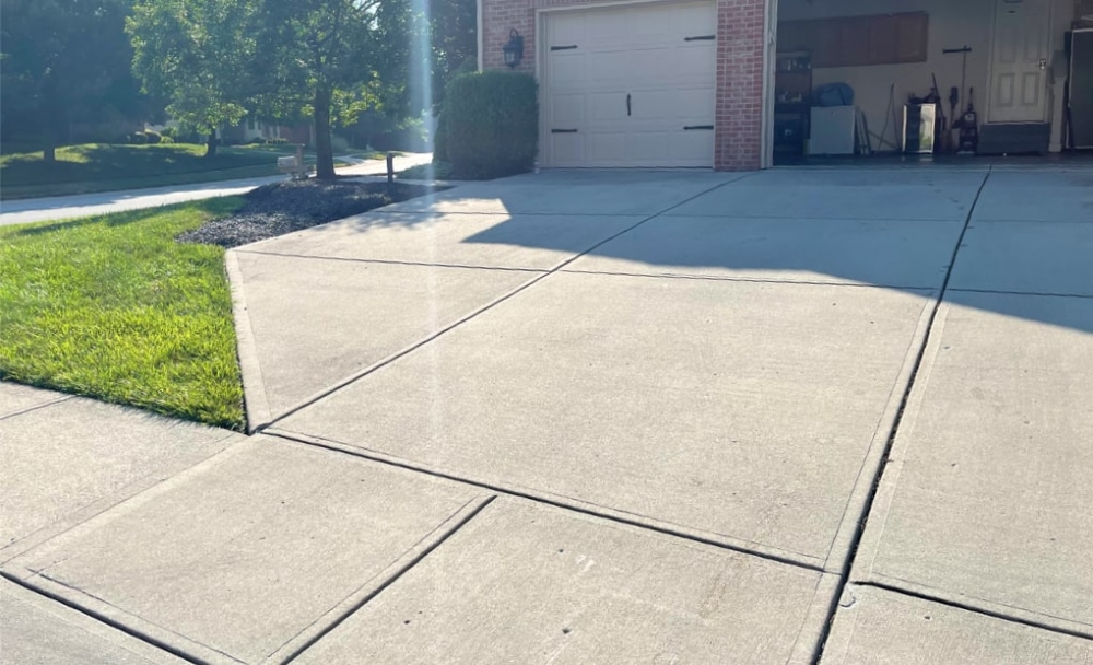 Concrete driveway leveled and sealed with DecoShield
