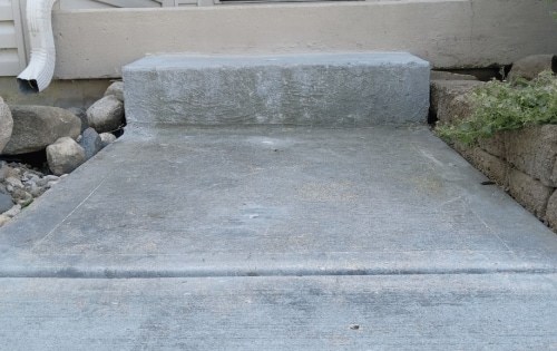 Sinking front concrete step after repair