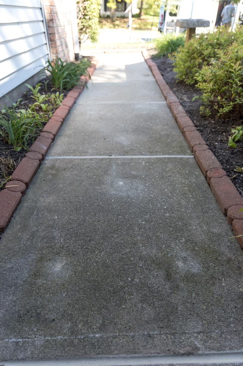 Repaired concrete walkway