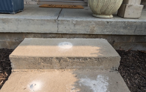 Uneven front steps before repair