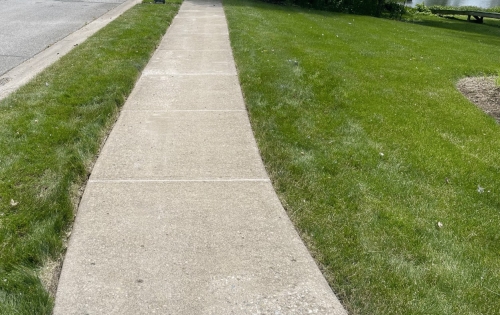 Rental property sidewalk after leveling