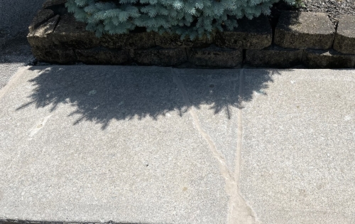Cracked sidewalk repair