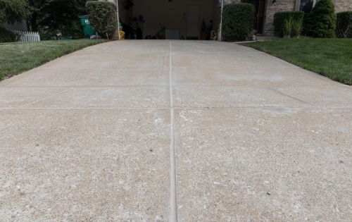 Repaired and sealed concrete driveway