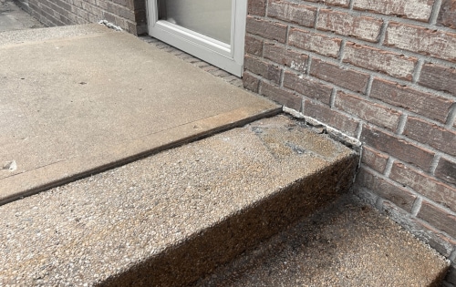 Sinking and uneven stairs before repair